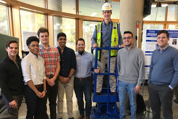 The full team, after the students’ final presentation. From left to right: Skanska EHS Coordinator Spencer Hasenkopf, Tevyn Fudge, Nigel Veach, Marcus Deans, Skanska EHS Director Boris Kiprovski, Michael Wood, Daniel Bolja, and Skanska Innovation and VDC Engineer Evan Reilly.