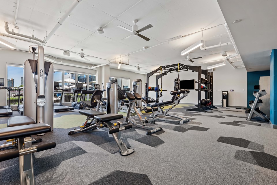 A fitness center is included in the apartment complex that features equipment for all exercise interests. (Photo credit: Kaltenbach Photography)