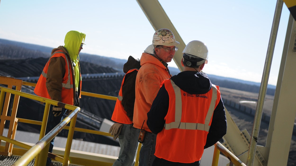 workers-on-top-of-power-plant
