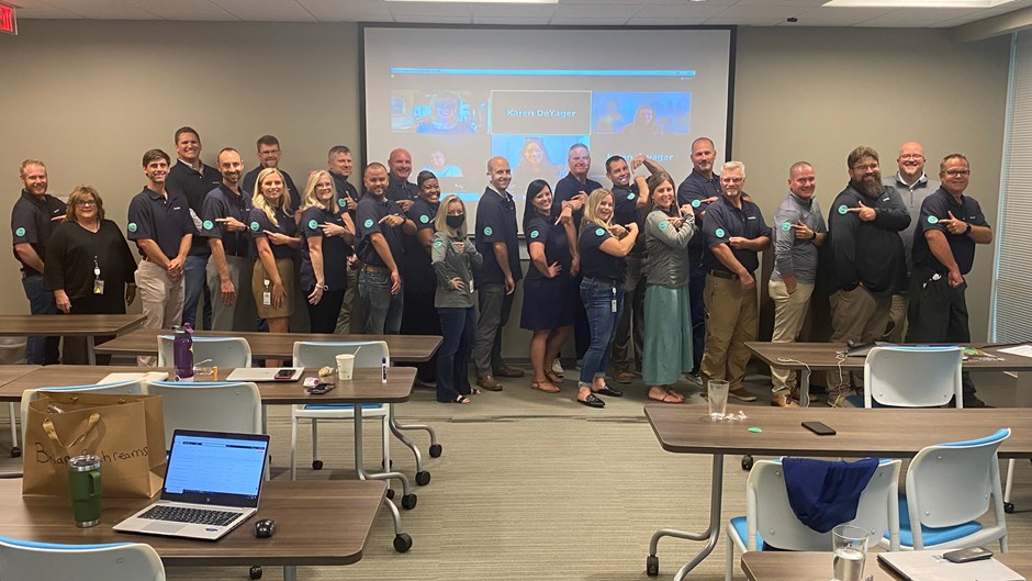 Newly-certified Mental Health First Aiders out of Nashville, Tennessee show off their Green Stickers after completing a recent training. Wearing a Green Sticker signals that you are willing and able to help someone who has a mental health concern. 
